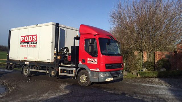 PODS Truck on lane for construction storage